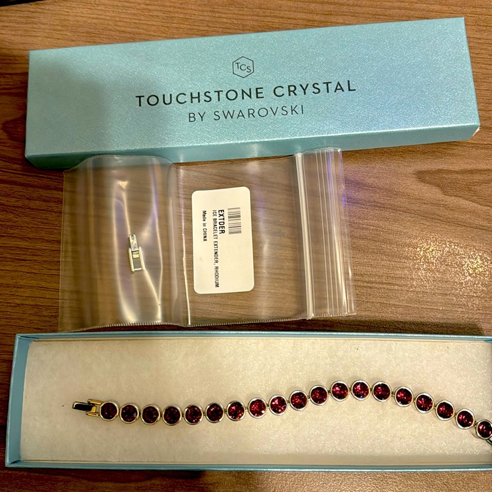 Ice bracelet in dark purple. Comes with extender. New - never worn